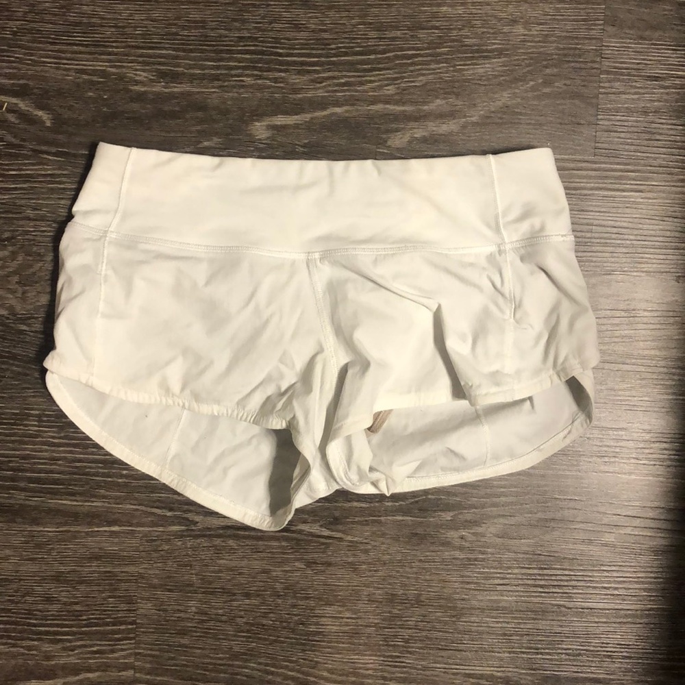 white lululemon shorts